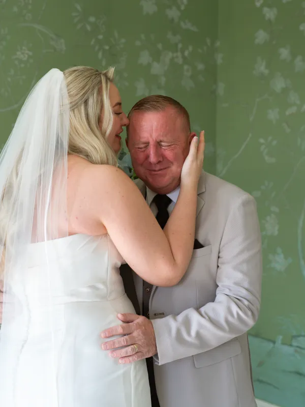 Bride shares an emotional first look with her father at Stubton Hall